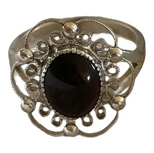 Beautiful sterling silver ring with black false stone